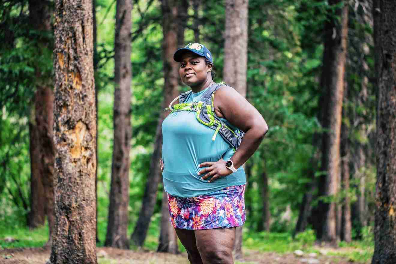 Mirna Valerio standing in the woods