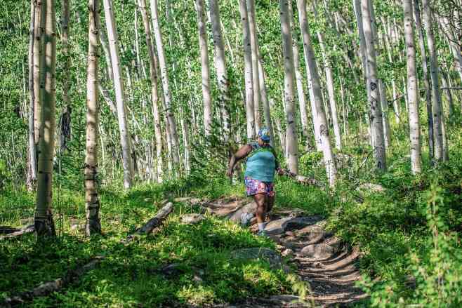 Mirna Valerio hiking in the woods